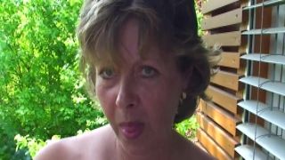 Busty MILF shows her pussy in a close up